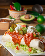 Burritos or tacos. Mexican or Tex-Mex food favorite. Seasoned meat, refried or black beans, Mexican rice, cheese, fried vegetables wrapped in homemade tortillas and served with salsa. Takeout favorite