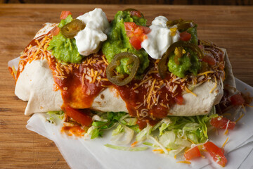 Burritos or tacos. Mexican or Tex-Mex food favorite. Seasoned meat, refried or black beans, Mexican rice, cheese, fried vegetables wrapped in homemade tortillas and served with salsa. Takeout favorite