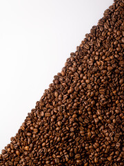 Coffee background. Coffee beans. Isolated over white background.  Triangle.