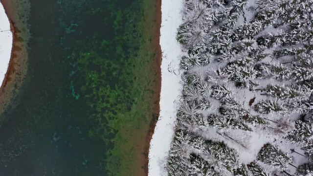 Aerial shot from above of Green Lake in Austrian Alps. Aerial view of winter landscape of gruner see lake in Styria.