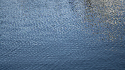 Sea ripples photos. Blue water.