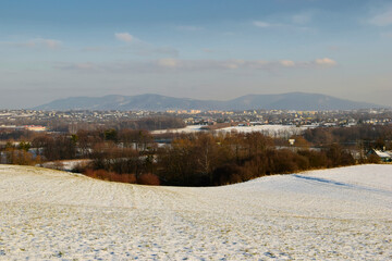 The city Bielsko-Biała against the backdrop of mountains in winter.