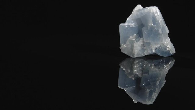 Calcite blue close-up. Black background.