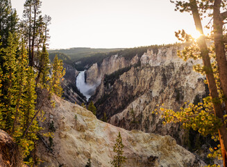 Lower falls in yellowstone national park at sunny day, focused on falls