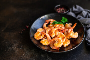 fried shrimps crustacean prawn seafood with spices ready to eat on the table for healthy meal snack outdoor top view copy space for text food background rustic image keto or paleo diet pescetarian