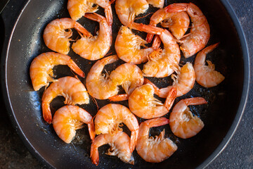 fried shrimps crustacean prawn seafood with spices ready to eat on the table for healthy meal snack outdoor top view copy space for text food background rustic image keto or paleo diet pescetarian