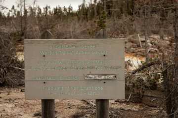 Close up of information board for steamboat gayser in yellowstone national park in america