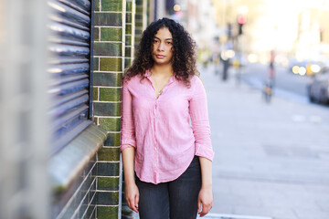 portrait of a young woman in the street