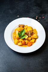 goulash with potatoes and meat stewed vegetables and pork ready to eat on the table for healthy meal snack outdoor top view copy space for text food background rustic image