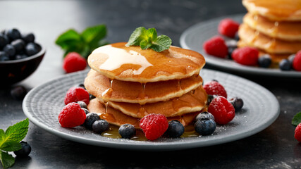 American pancakes with fresh blueberry, raspberry and honey. Healthy morning breakfast - obrazy, fototapety, plakaty