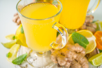 Immune boosting natural vitamin healthy drink for resist virus. Fresh organic ginger and citrus juice  Vegan Immunity system booster beverage