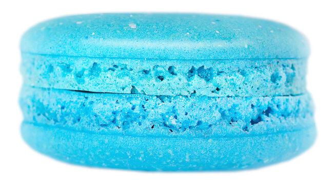 One blue french macarons close-up isolated on a white background.