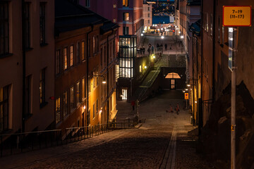 Building in Stockholm decorated with yellow light lantern. Winter, christmas decoration