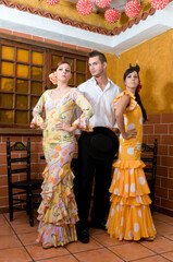 Fototapeta na wymiar flamenco dancers at the Seville fair in April in Spain