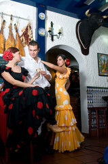 Obraz premium flamenco dancers at the Seville fair in April in Spain