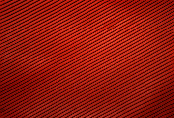 Texture of red rubber with voluminous stripes
