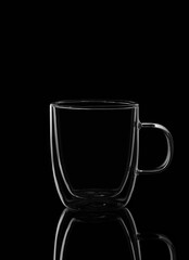 
Glass mug on black background