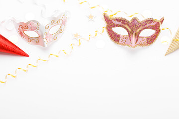 Carnival mask and confetti