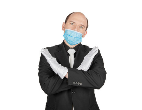 Handsome young business man wearing surgical medical virus protection white mask incorrect wrong way isolated