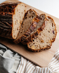 Fresh loaves of bread on a white table
