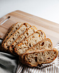 Fresh loaves of bread on a white table