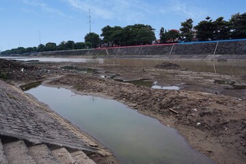 The “West Flood Canal” river in Semarang is dry in summer, water crisis and cases of Drouht impact or climate change.