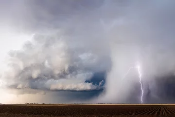 Fotobehang Hail storm and lightning bolt © JSirlin