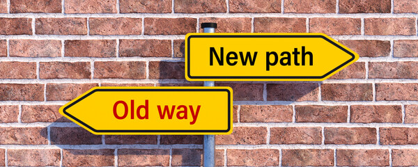 Fototapeta na wymiar street signs pointing in different directions with the message NEW PATH and OLD WAY in front of a brick wall background