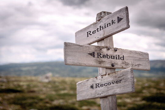 rethink rebuild recover signpost outdoors in nature