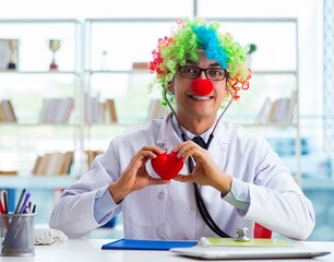 Child cardiologist with stethoscope and red heart