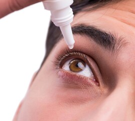 Young man in eye care medical concept