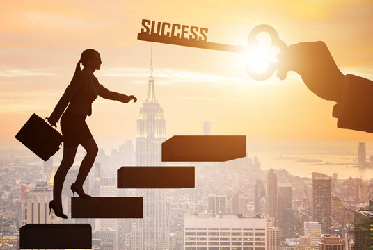 Businesswoman climbing the career ladder of success