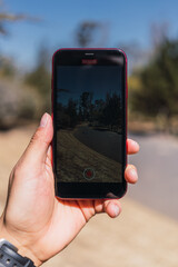 man holding phone with hand. social media concept