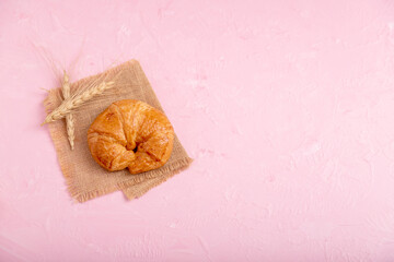 croissants and wheat on the brown sack