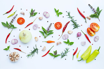 Cooking ingredients, Various fresh vegetables and herbs on white background.