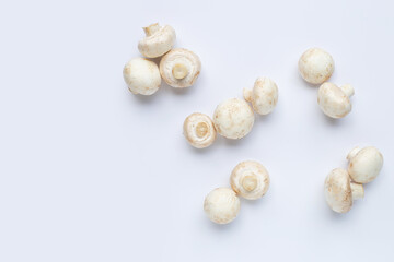 Champignon mushrooms on white background. Top view