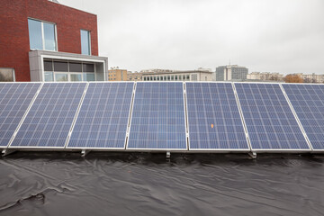 the solar panels on the roof on a raining day