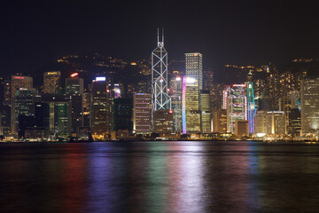 Victoria Harbor Skyline and Two International Finance Center  at night in Hong Kong