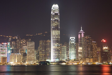 Fototapeta na wymiar Victoria Harbor Skyline and Two International Finance Center at night in Hong Kong