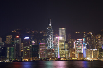 Obraz na płótnie Canvas Victoria Harbor Skyline and Two International Finance Center at night in Hong Kong