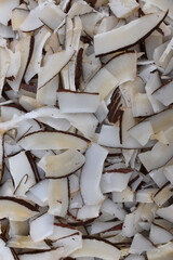 heap of brown coconut slice .Closeup shot of white slices