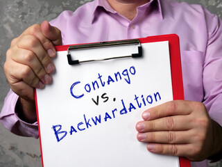  Financial concept about Contango vs. Backwardation with inscription on the sheet.