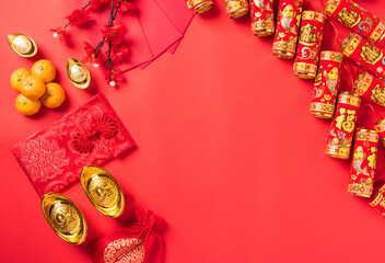 Fototapeta premium Chinese new year 2021 festival, Flat lay top view lunar new year or Happy Chinese new year celebration decorations with copy space on red background (Chinese character 