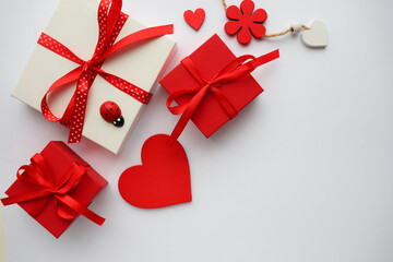 valentine's day background. valentine's day gift concept. gift box on a white background and a red heart.