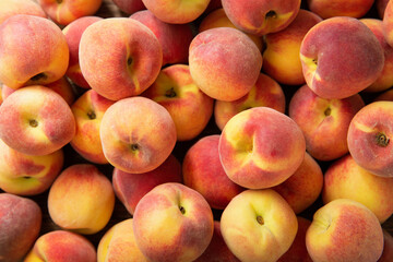 fresh peaches as background, top view