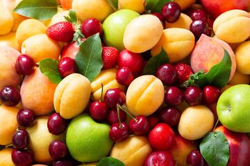 fresh fruits and berries as background, top view