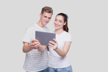 Couple Using Tablet Isolated. Couple Shopping Online.