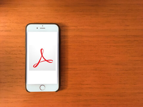 Adobe acrobat logo on mobile phone screen logo on mobile phone screen