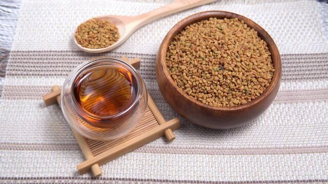 Fenugreek Seeds or MethiDana drink by speaking it in water overnight. close up