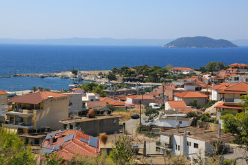 Fototapeta na wymiar greek landscape with town and sea
